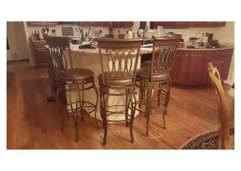 4 swivel bar stools - like new